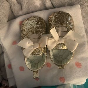 2pair of baby gold shoes